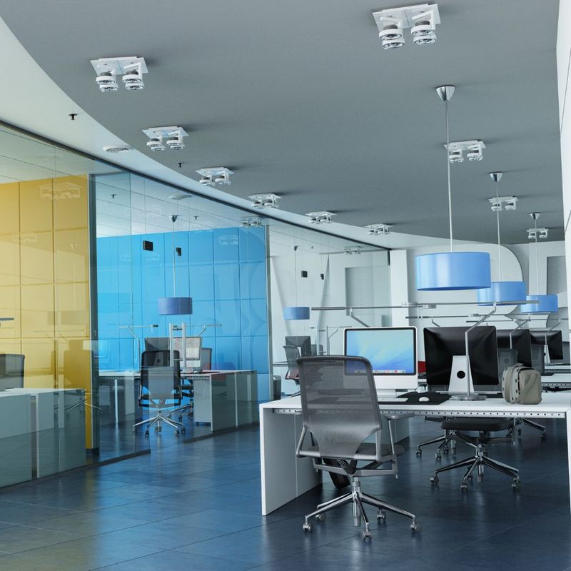 Bright office interior with desks and chairs
